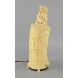 Carved Indian Ivory tusk depicting harvesting scenes with cover of an elephant engaged with a