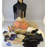 An assortment of 19th and 20th C textiles including a Victrorian shoulder cape with jet beads,