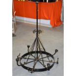 Turn of the century chandelier converted from reportedly an artillery cartwheel Provenance:  From