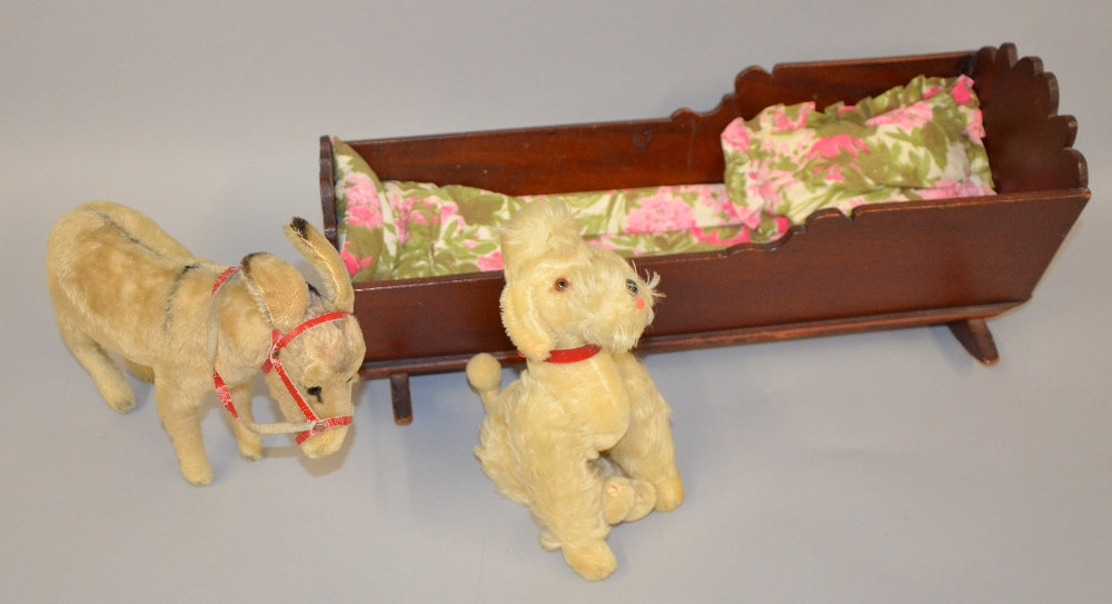 20th century doll's rocking cot, donkey and dog,