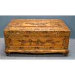 Camphorwood coffer with carved decoration, 42cm x 91cm x 60cm