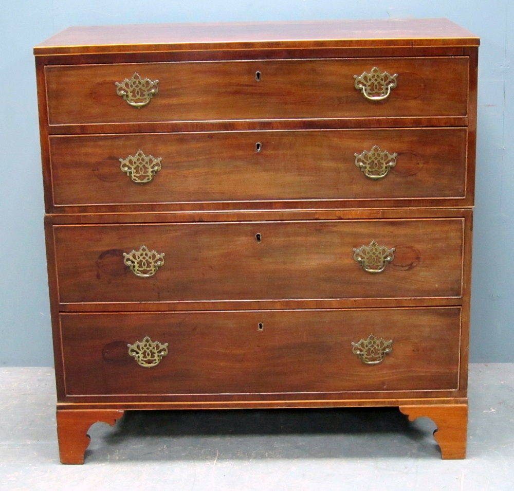 19th century mahogany chest of four long graduated drawers to bracket feet, (splits into two