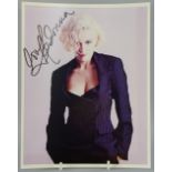 Madonna, American Singer, a colour photograph signed boldly in black 'Love Madonna'