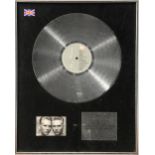 Bros, BPI Platinum disc presented to CBS Records to recognise sales in the United Kingdom of more