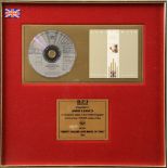 Eurythmics, BPI CD presented to Annie Lennox to recognise sales in the United Kingdom of more than