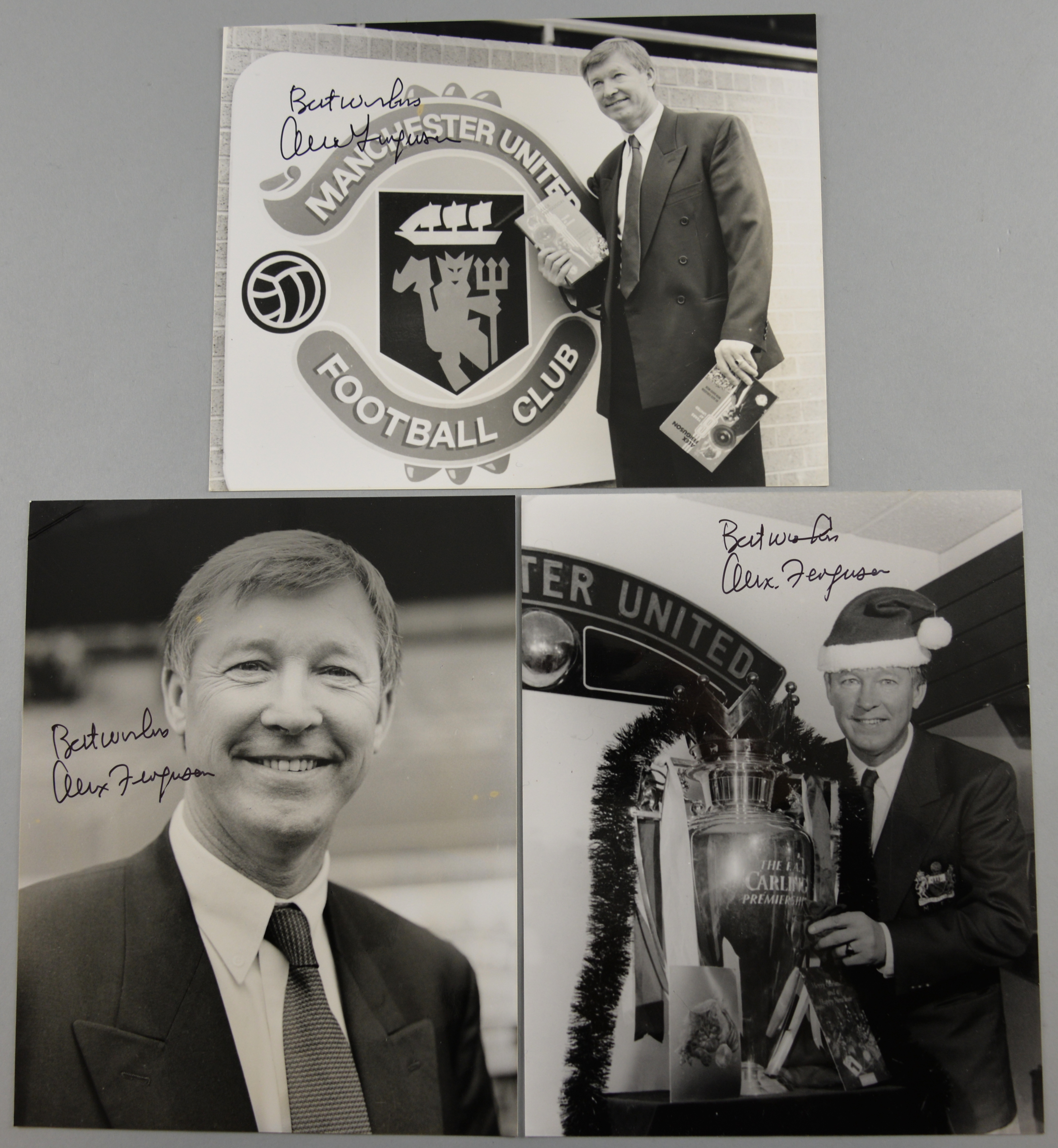 Three signed photographs of Sir Alex Ferguson, one showing Sir Alex Ferguson with the Premiership