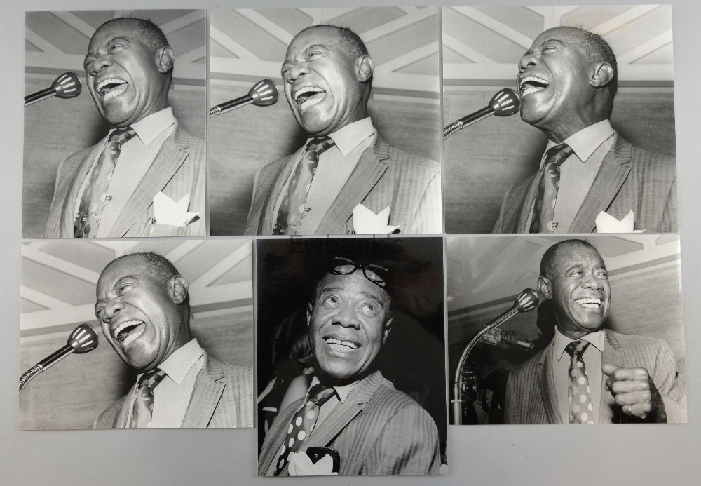 Louis Armstrong, 6 black & white photographs by Harry Goodwin, stamped on reverse, various sizes.