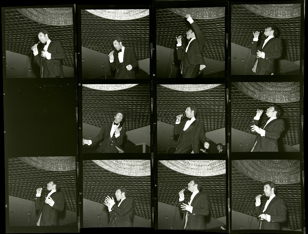 Tom Jones, 11 black & white negatives showing him performing, by Harry Goodwin, sold with full