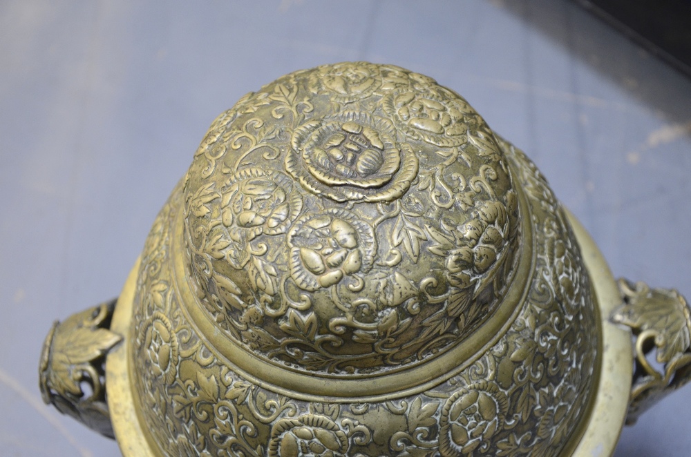 Chinese brass twin-handled censer and cover with embossed floral decoration, applied mark to base, - Image 4 of 7