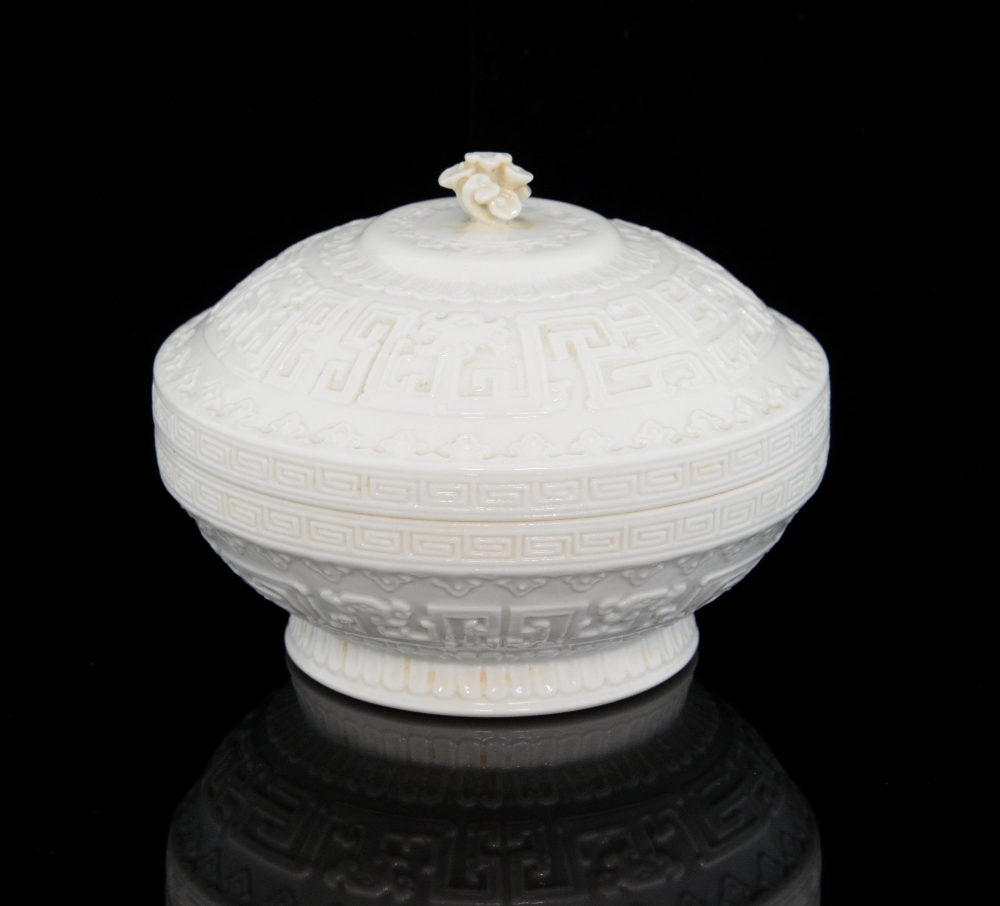 Chinese white glass bowl and cover with j'ui  fungus finial and moulded scrolling decoration,