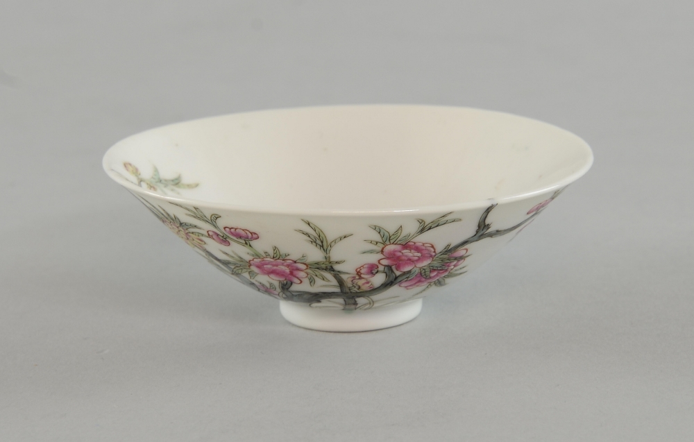 Chinese porcelain small bowl decorated with flowers and foliage on round foot, six character mark to