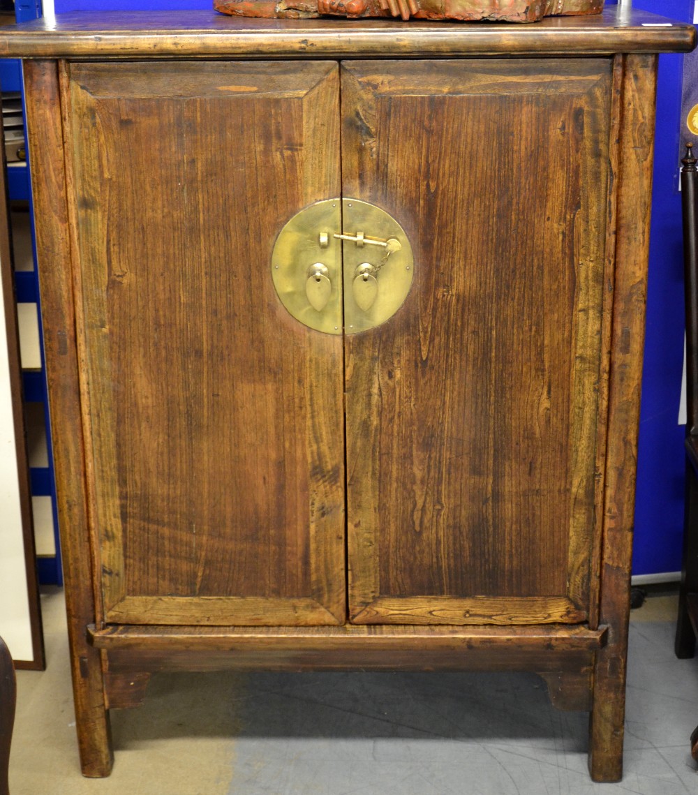 Chinese hardwood and brass bound cupboard 120cm x 95cm
