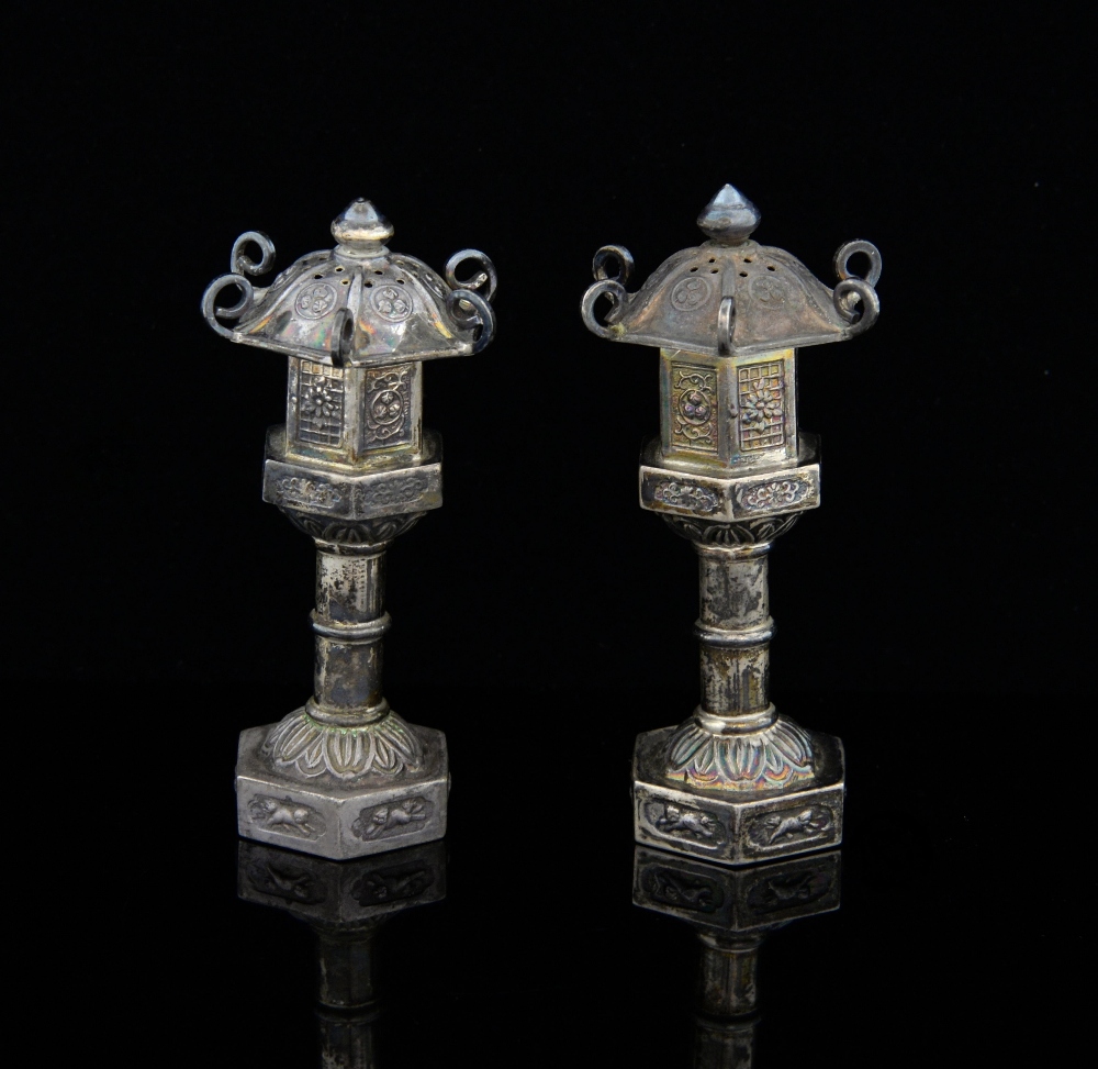 Pair of Japanese Sterling silver salt and pepper castors in the form of standing lanterns with