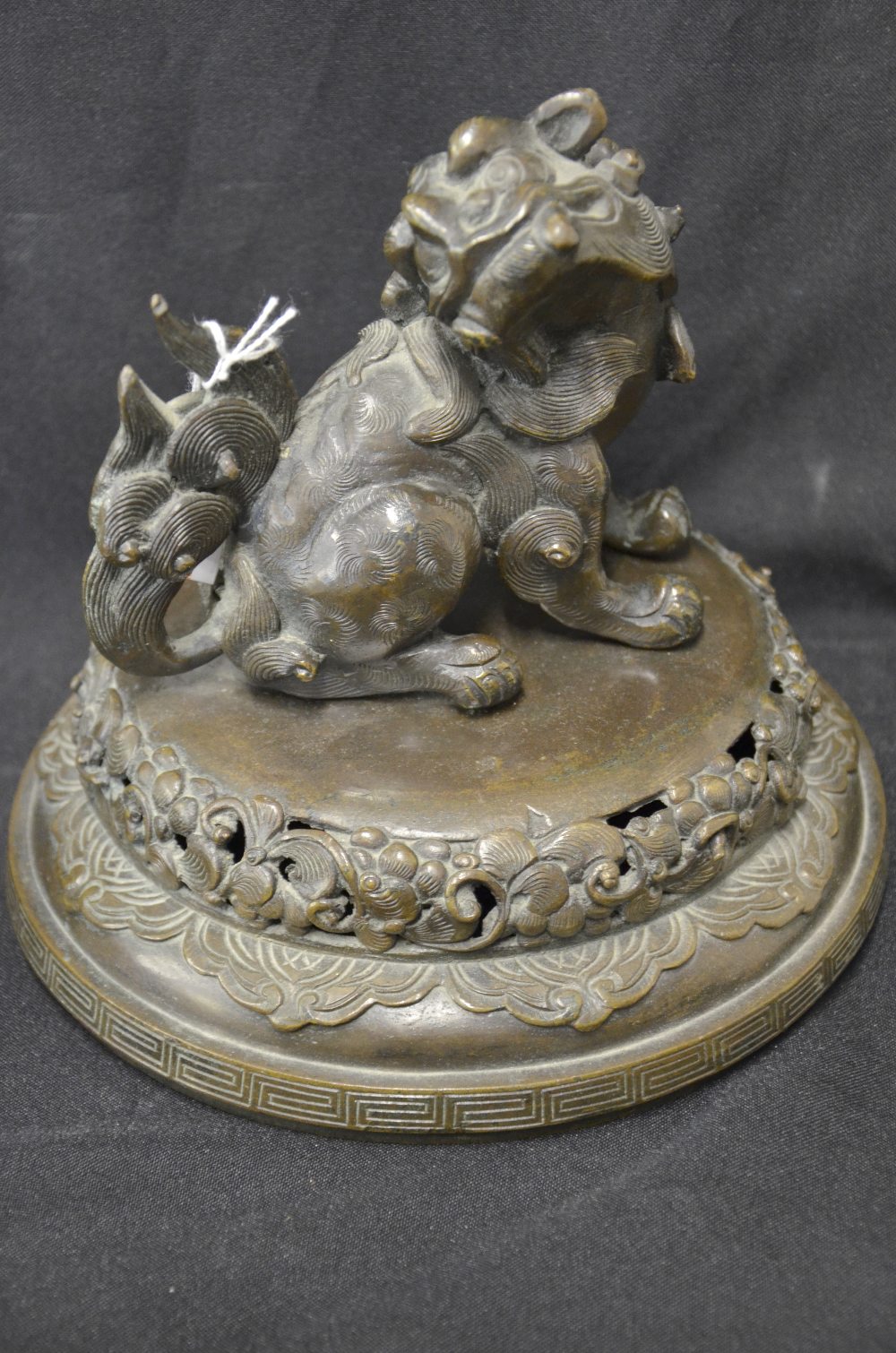 Chinese bronze censer cover with temple lion finial, 20.5cm diameter, and a smaller similar pair, - Image 2 of 3