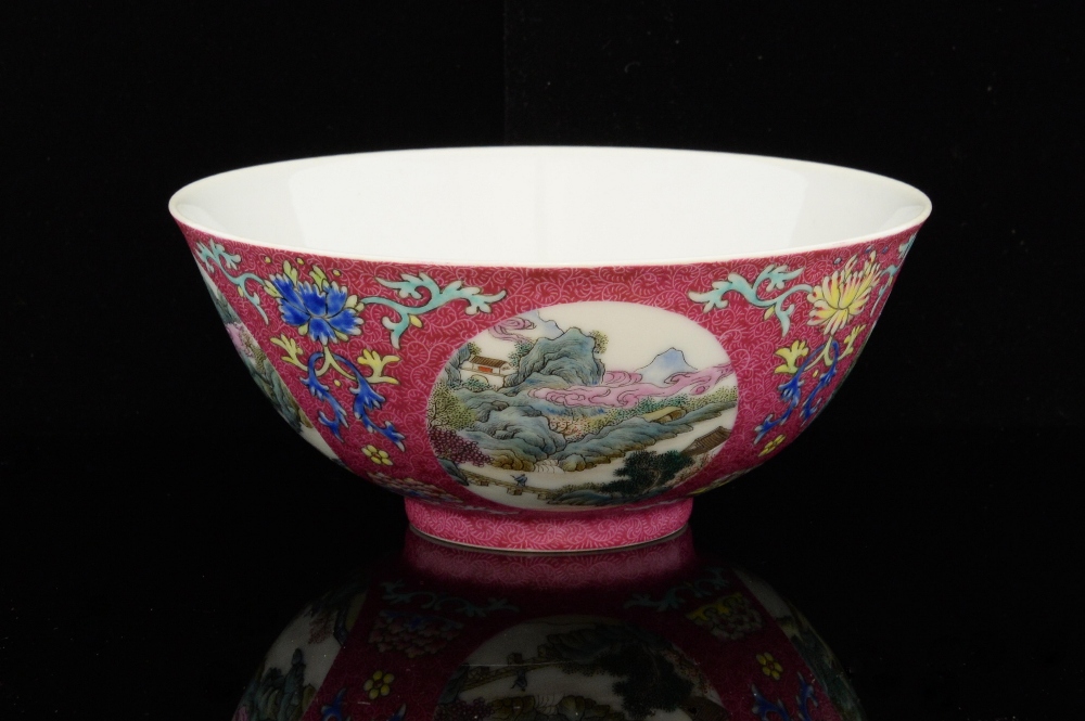 Chinese famille rose bowl, the dark pink ground with scrolling decoration and four circular panels