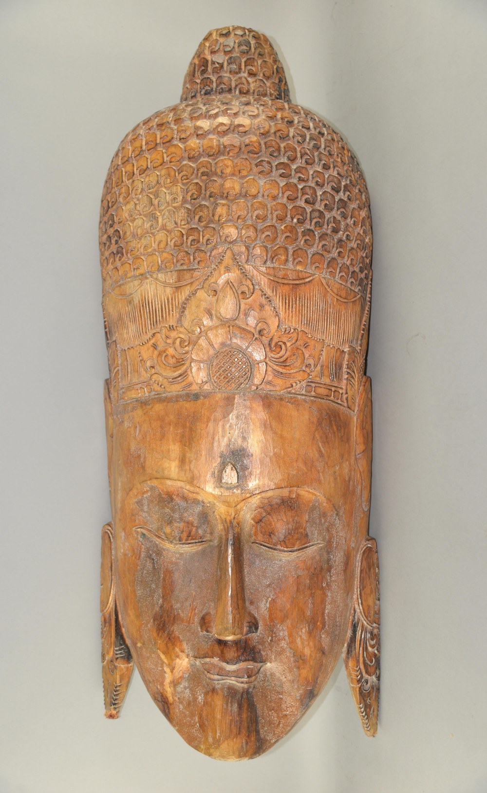 Carved wood Tibetan mask of a Goddess, height 110cm,