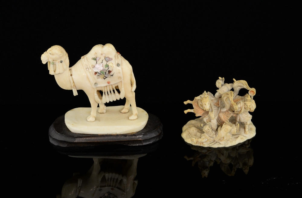 Chinese ivory carving of warrior figures 4cm and an ivory carving of a camel, 9cm high,
