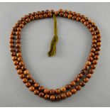 Chinese hardwood bead necklace made up of 108 uniform beads,