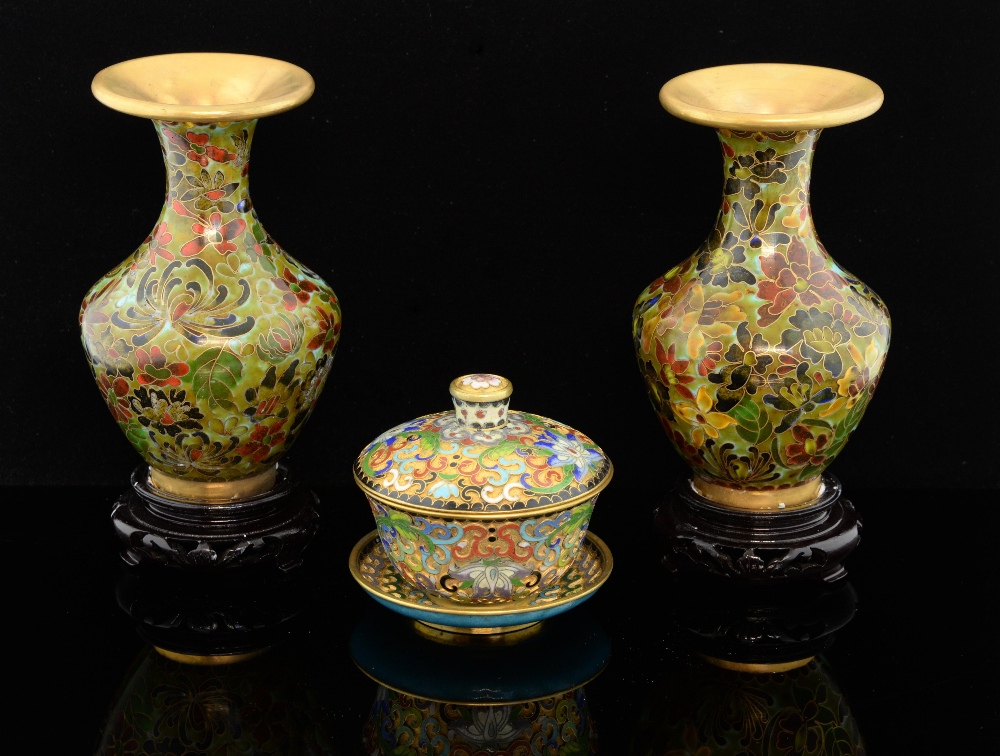 Pair of modern Chinese cloisonne vases, the mottled ground decorated with flowers and foliage, on