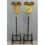 Pair of Chinese gilt bronze fan shaped banner plaques supported on tall turned wooden poles, each