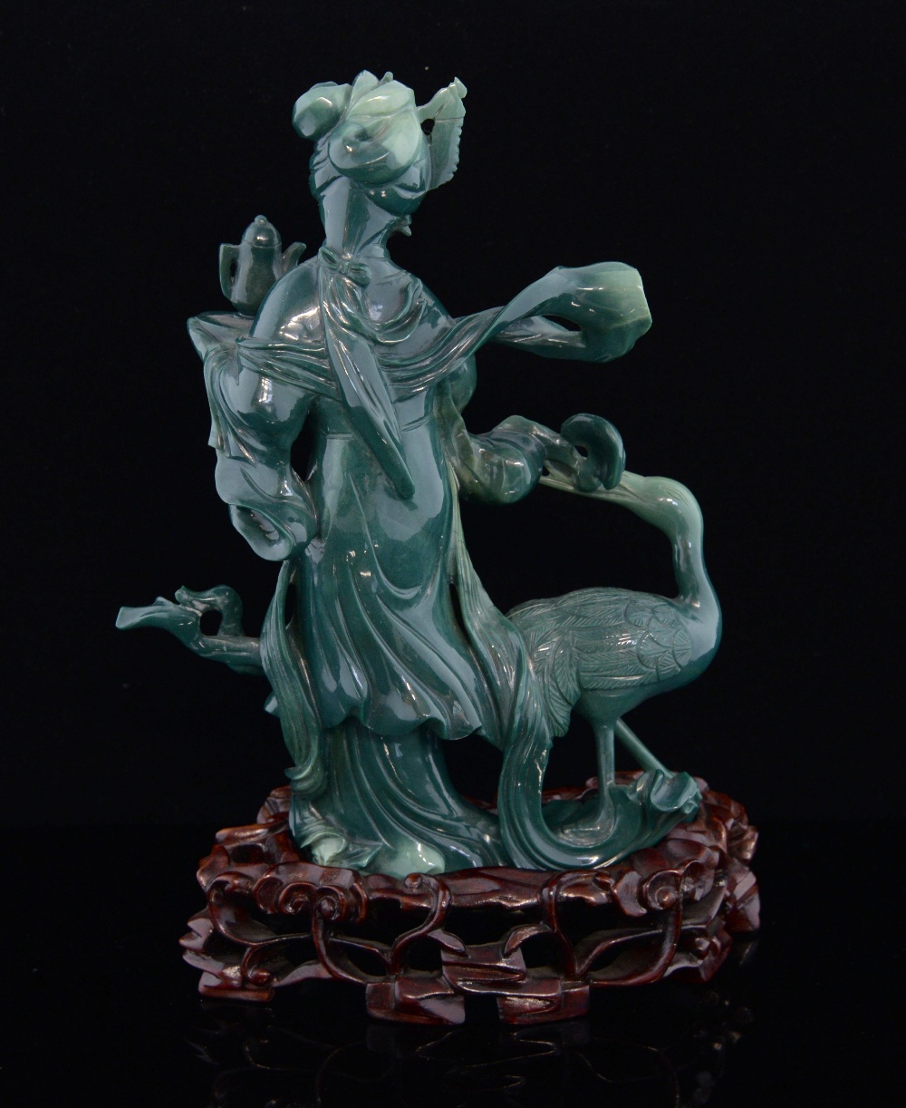 Chinese moulded glass figure of a lady with a tray and teapot and a crane at her feet, on hardwood - Image 2 of 2