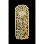 Chinese carved ivory mirror handle with floral decoration, 13cm long,