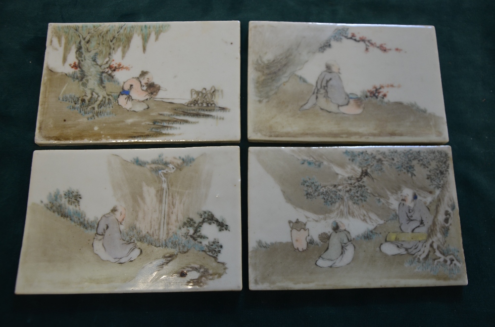 Set of twenty-eight late 19th/ early 20th century Chinese porcelain tiles depicting figures at - Image 5 of 17