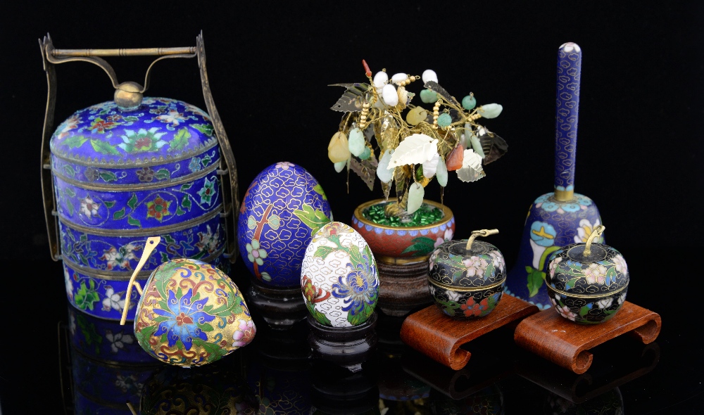 Modern Chinese cloisonne enamelled hand bell, the blue ground decorated with flowers and foliage,