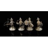 Set of four Chinese Sterling silver figures of orientals at various pastimes, one with net another