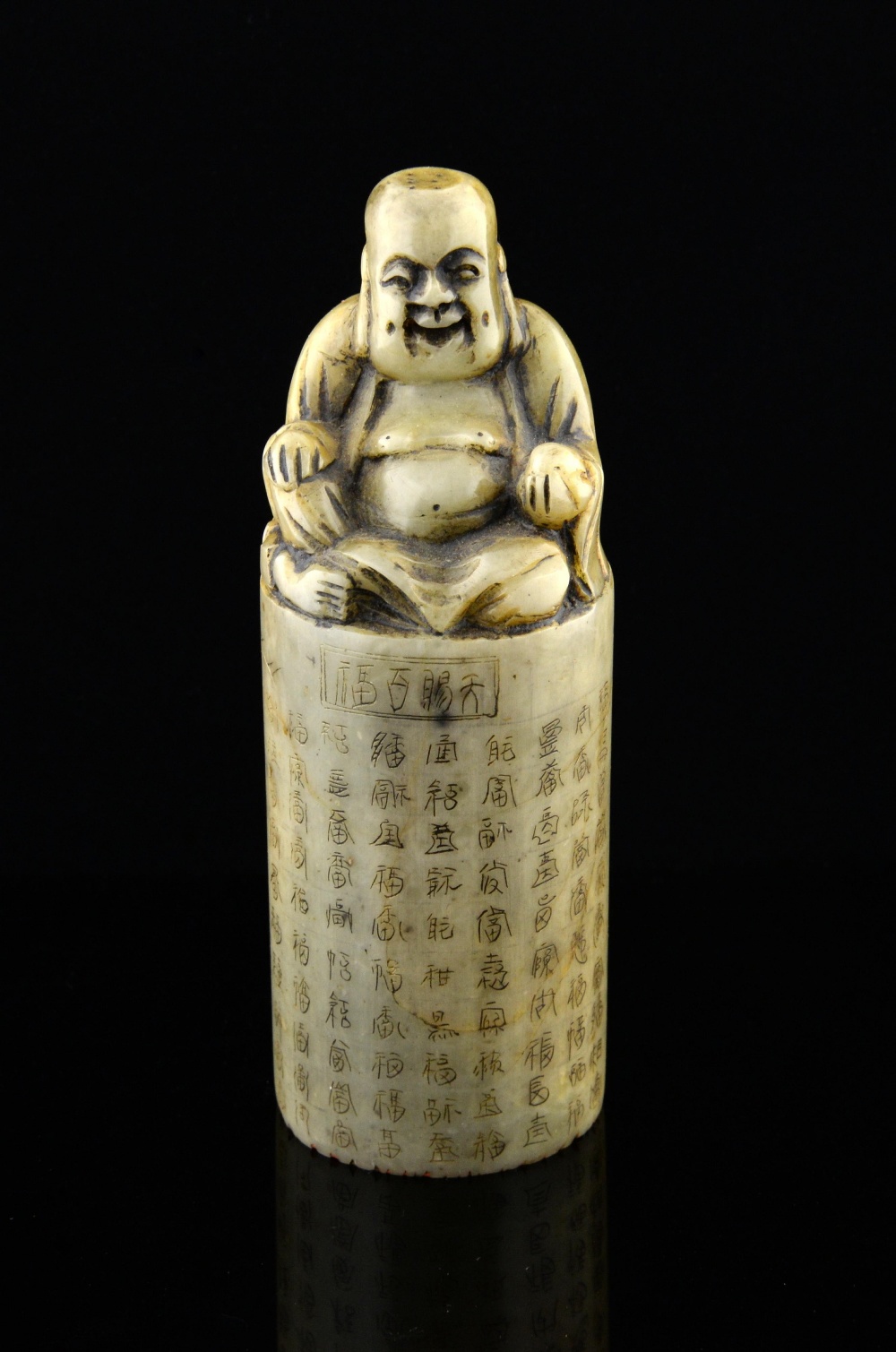 Chinese green soapstone seal with numerous calligraphy and a landscape with Buddha surmount, 14.