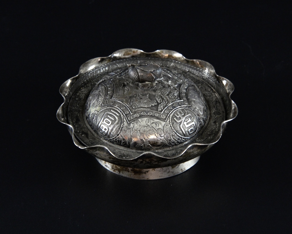 Chinese silver dish of shaped circular form engraved with figures at various pastimes, the cover