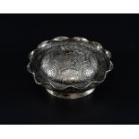 Chinese silver dish of shaped circular form engraved with figures at various pastimes, the cover