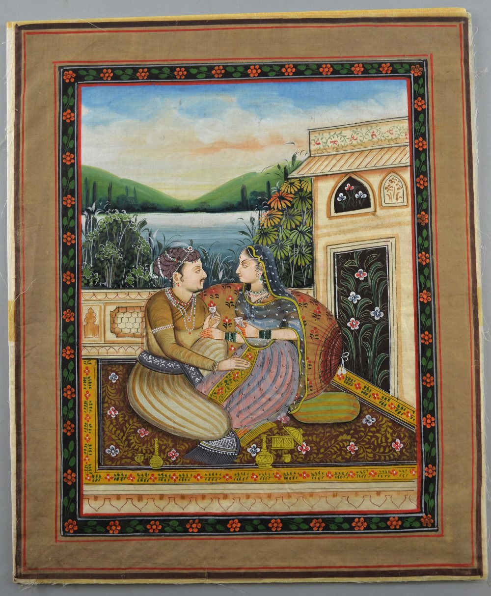 Indian miniature painting depicting a man and woman seated on a carpet on a balcony with a lake