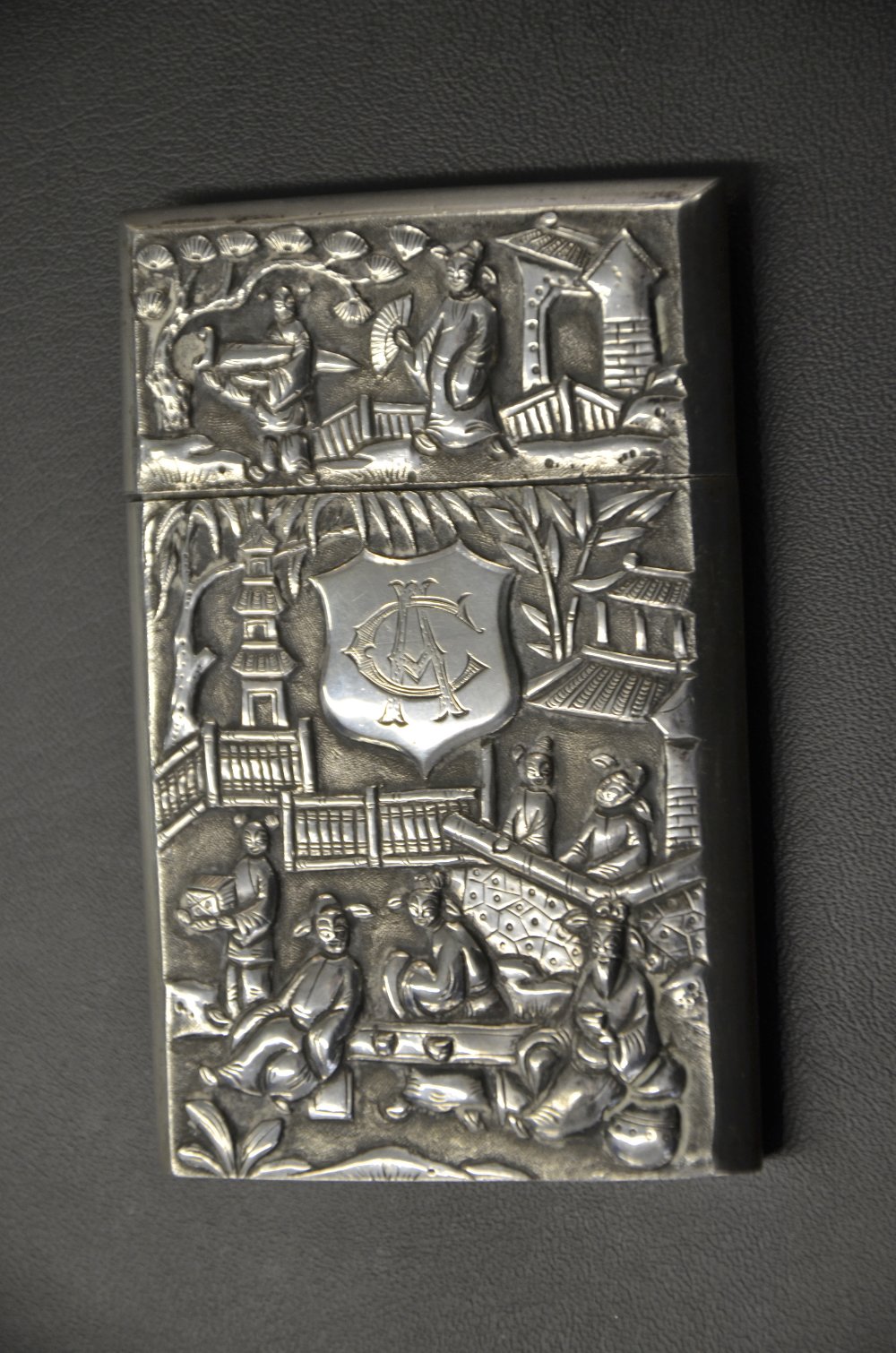 Late 19th/ early 20th century Chinese silver card case with a slip cover, embossed scenes of figures - Image 4 of 6