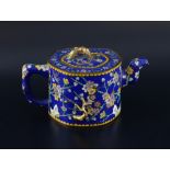 Chinese cloisonne enamelled teapot and cover, the blue ground with moulded and coloured floral