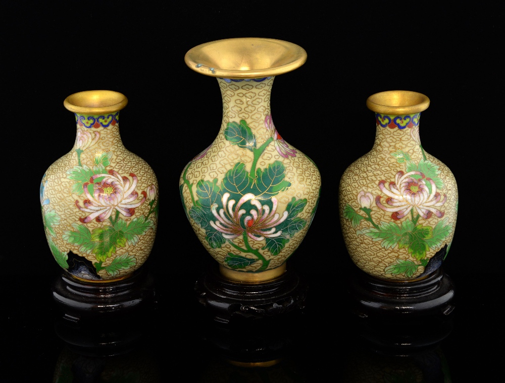 Pair of modern Chinese cloisonne vases, the light coloured ground decorated with flowers and