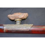 Chinese red resin and white metal mounted opium pipe decorated with a crab, 50cm long,