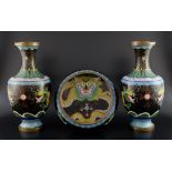 Pair of Chinese cloisonn‚ black ground vases decorated with yellow dragons chasing the flaming