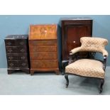 Mahogany single door cabinet, walnut bureau, serpentine bedside chest and a button back armchair