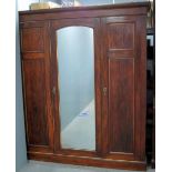 Late 19th Early 20th century walnut triple wardrobe with central mirrored door