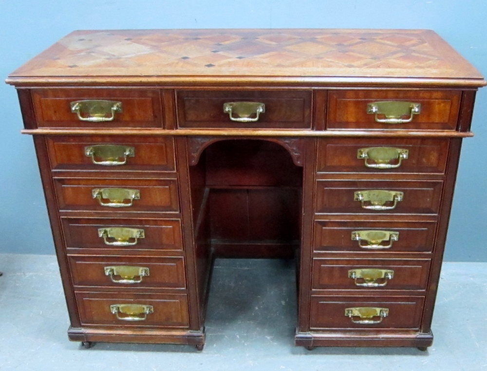 Late Victorian two pedestal writing desk, the parquetry top over 13 shallow drawers. 102cm - Image 2 of 2