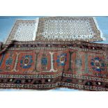 Four similar cream and brown ground rugs and one other red ground runner (5)