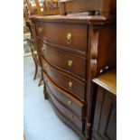 Serpentine chest of drawers