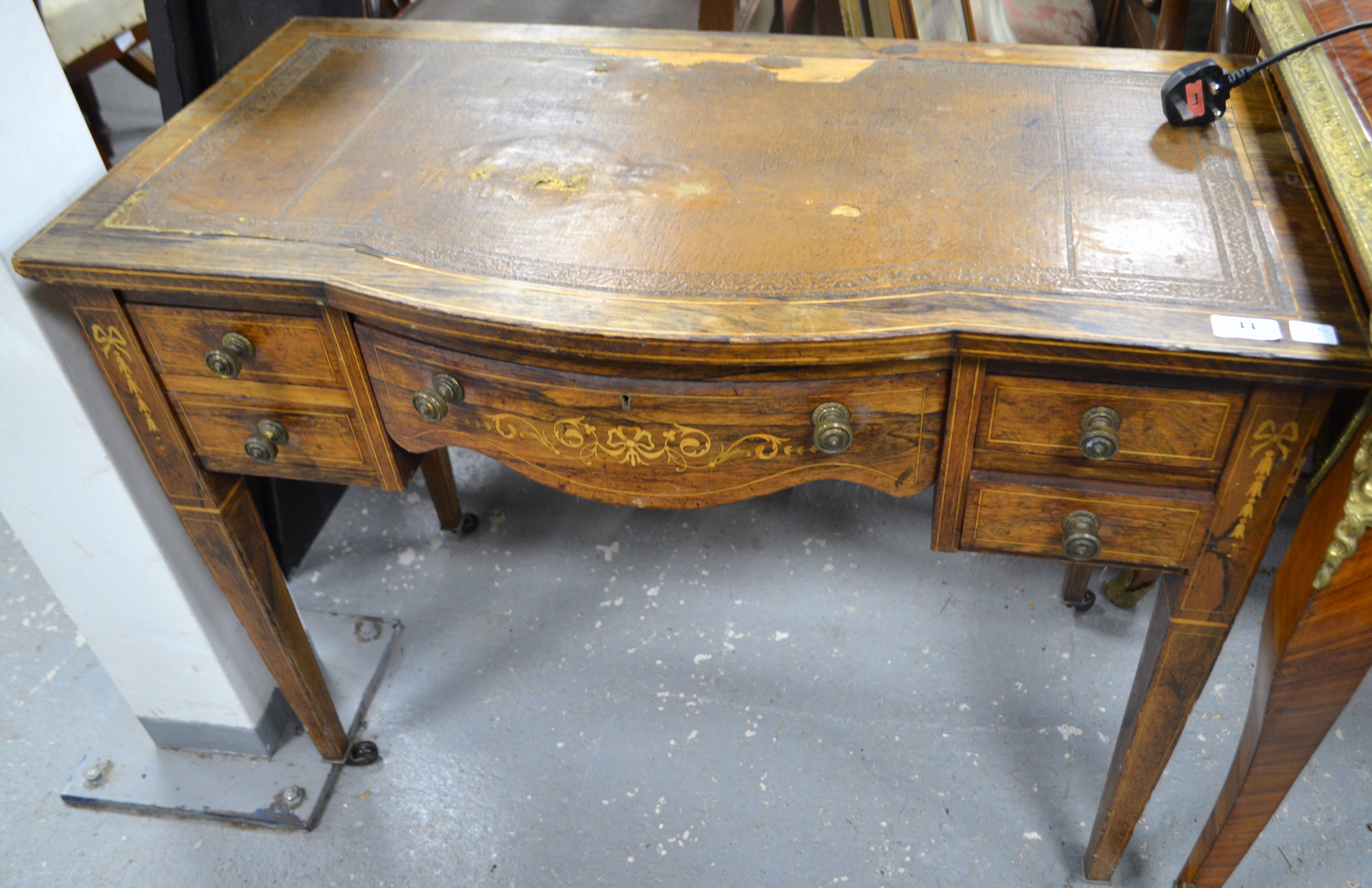 Late 19th century rosewood and inlaid shaped front desk with central drawer and two drawers to