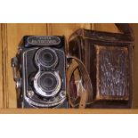 Minolta Autocord twin lens reflex camera and leather case