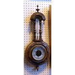 Victorian walnut barometer and thermometer in carved mahogany case 57 cm high