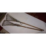 Two vintage lacrosse sticks