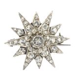 A mid 20th century paste star brooch, set with graduated circular-shape pastes in claw settings.