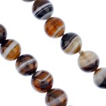 A banded agate bead necklace, comprising a series of thirty-nine graduated banded agate beads,