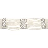 An early 20th century imitation pearl and paste silver gilt choker, designed as ten rows of